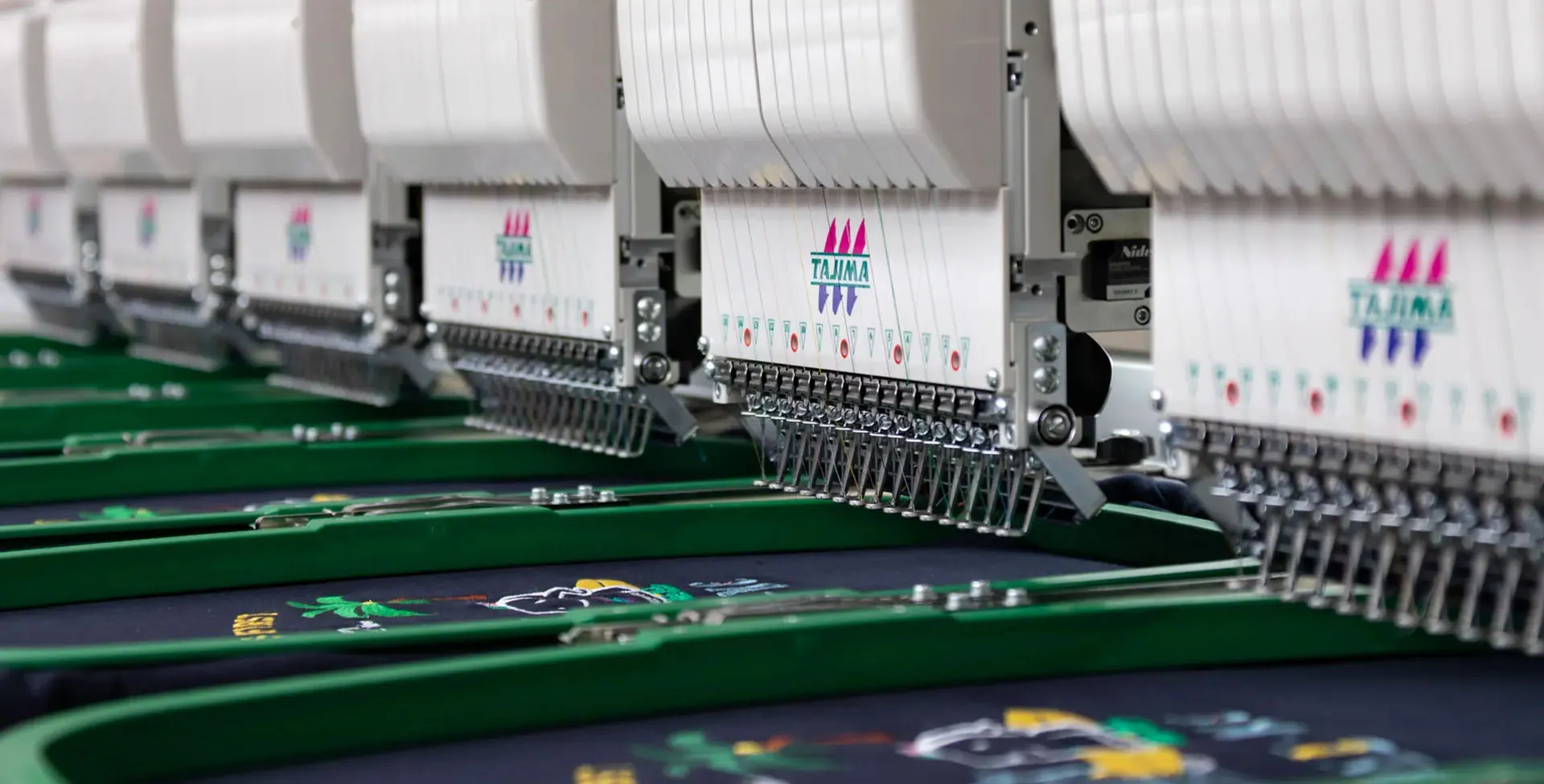 Embroidered logo stitched into apparel in the Corvallis Custom shop